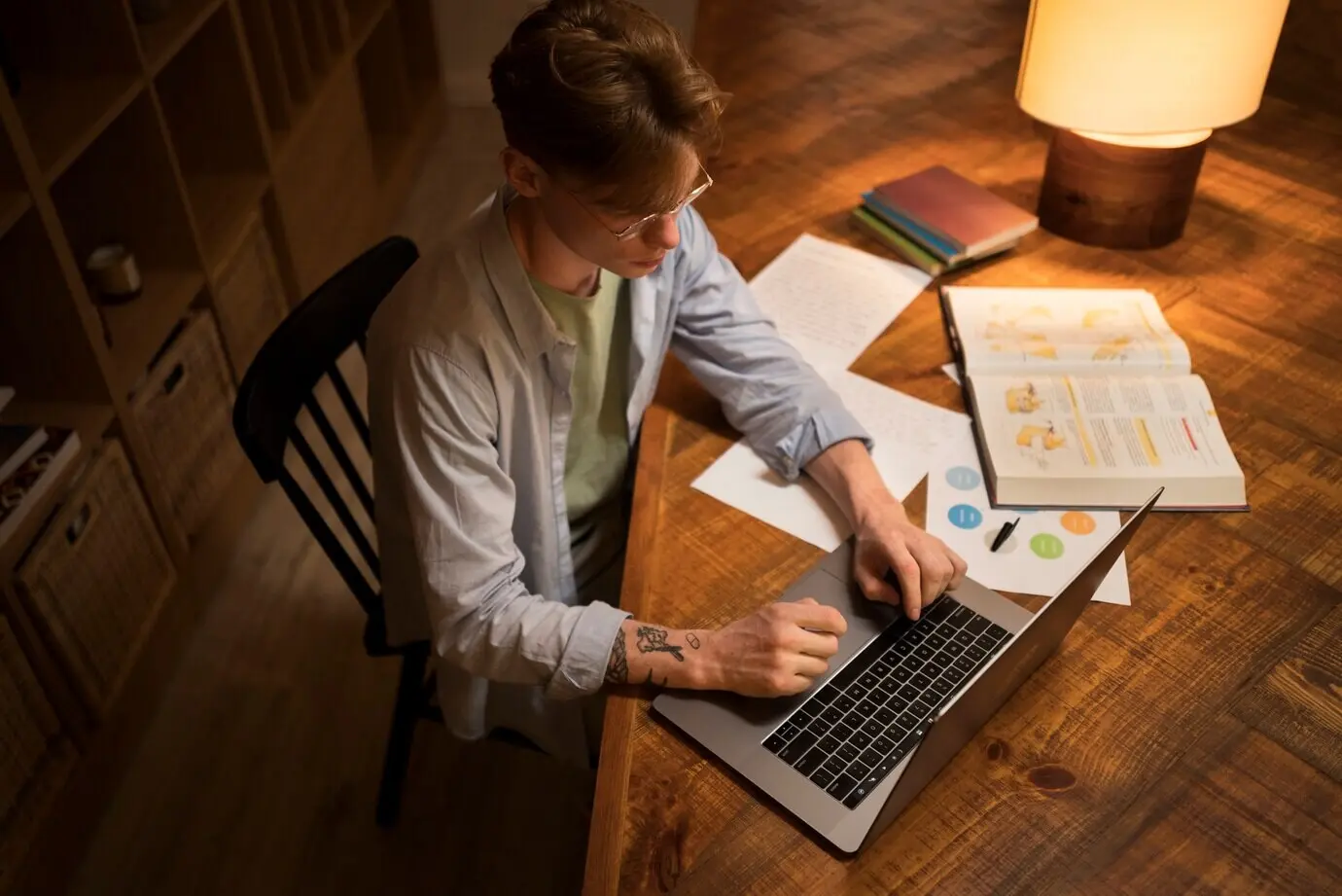 A young man studying in a virtual classroom